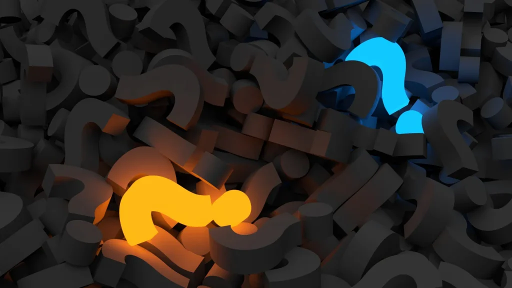 Glowing orange and blue question marks emerging from a pile of dark question marks, representing the importance of clarity and addressing customer queries in lead generation.