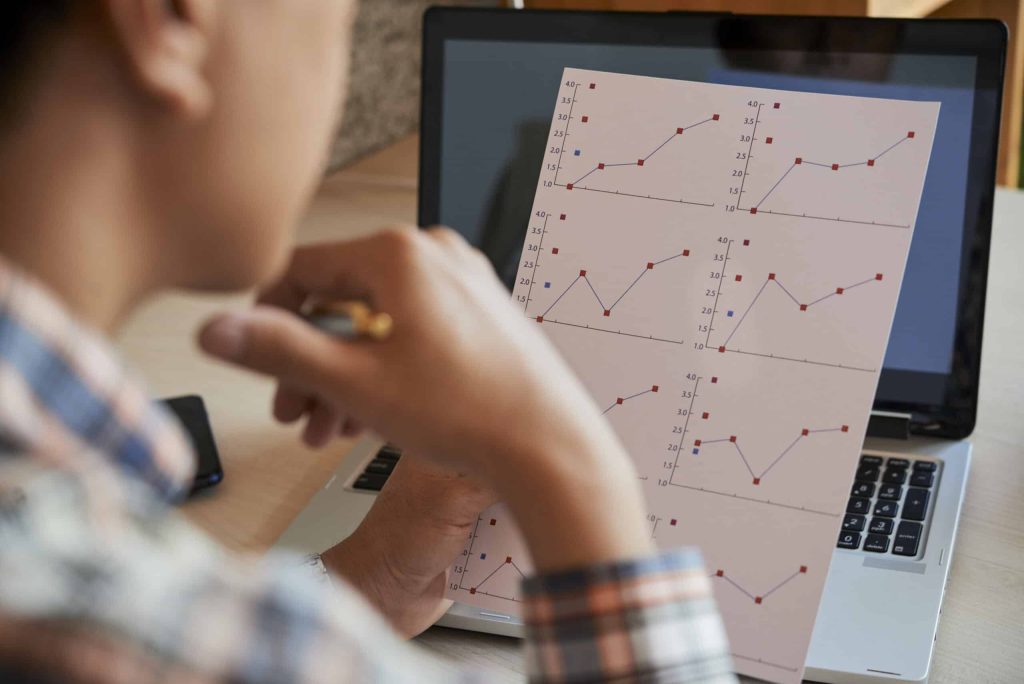 Document with financial annual report in hands of offica manager